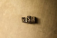 Visa in wood-gold background